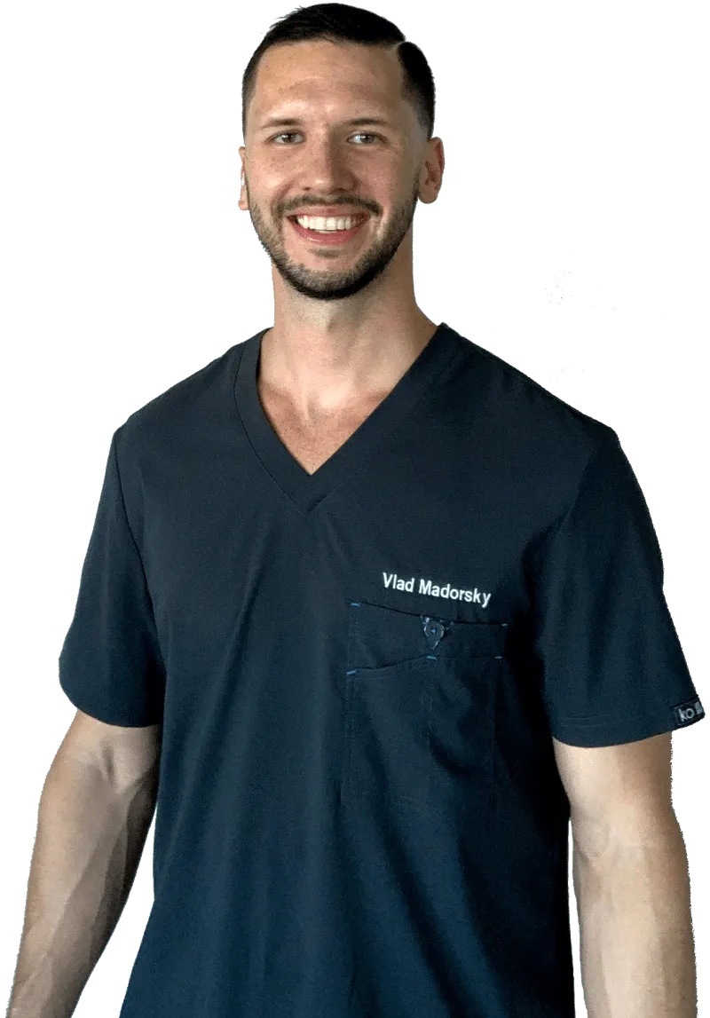 Dr. Vlad Madorsky, PT, DPT, CSCS in scrubs
