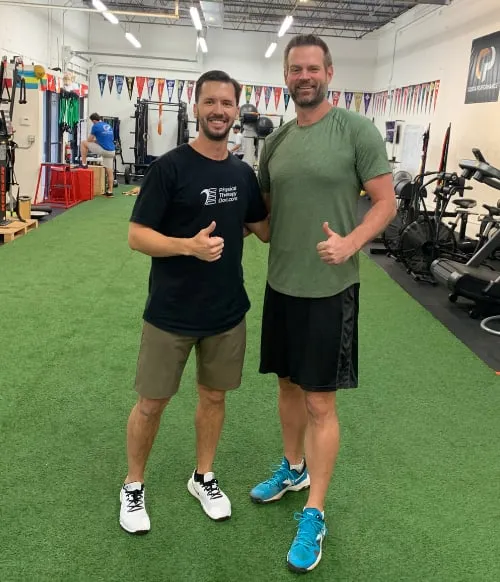 Dr. Vlad Madorsky with client Landon S. at Physical Therapy Doc in West Boca Raton